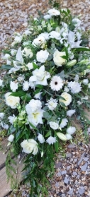 seasonal white casket spray